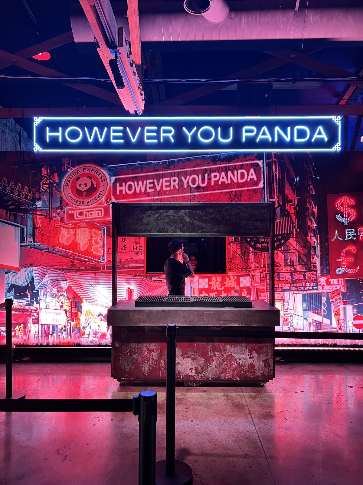 Neon-lit street food stall set against a glowing city backdrop